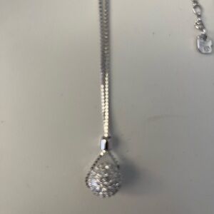 Swarovski new in box ball drop necklace.